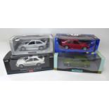 Fours 1:18 scale die-cast model cars, comprising two UT Models, a Ford Escort RS Cosworth in silver,