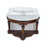 A Victorian mahogany and white Carrara marble washstand, of demi lune form, the marble surface