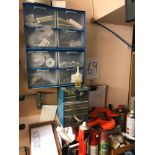 A shelf and cabinets of tools, screws etc.