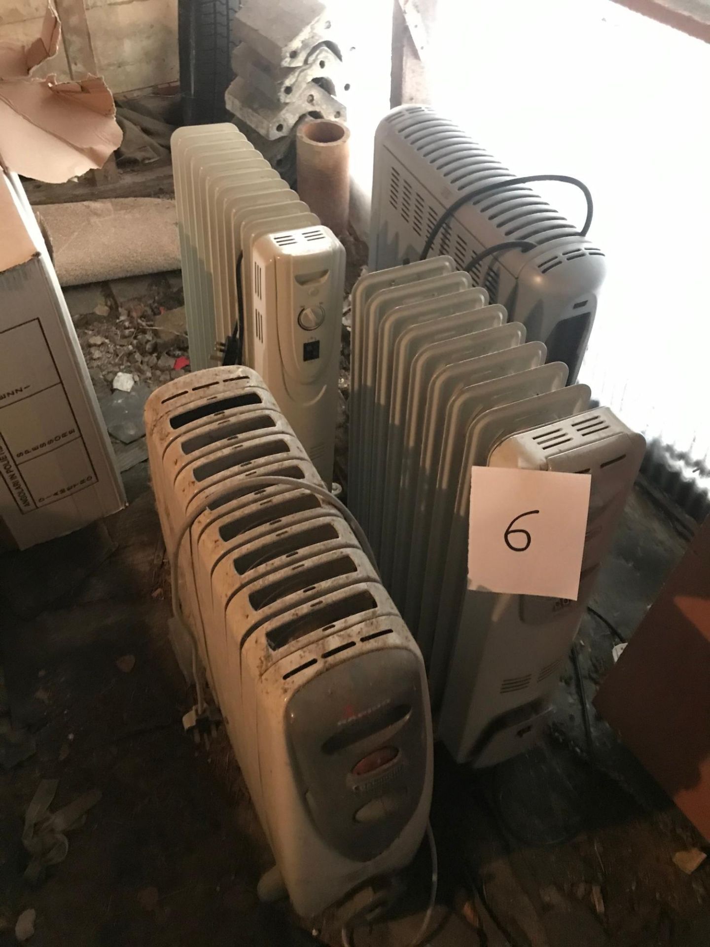 A group of four electric radiators.