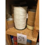 Shelf of tape and cord.
