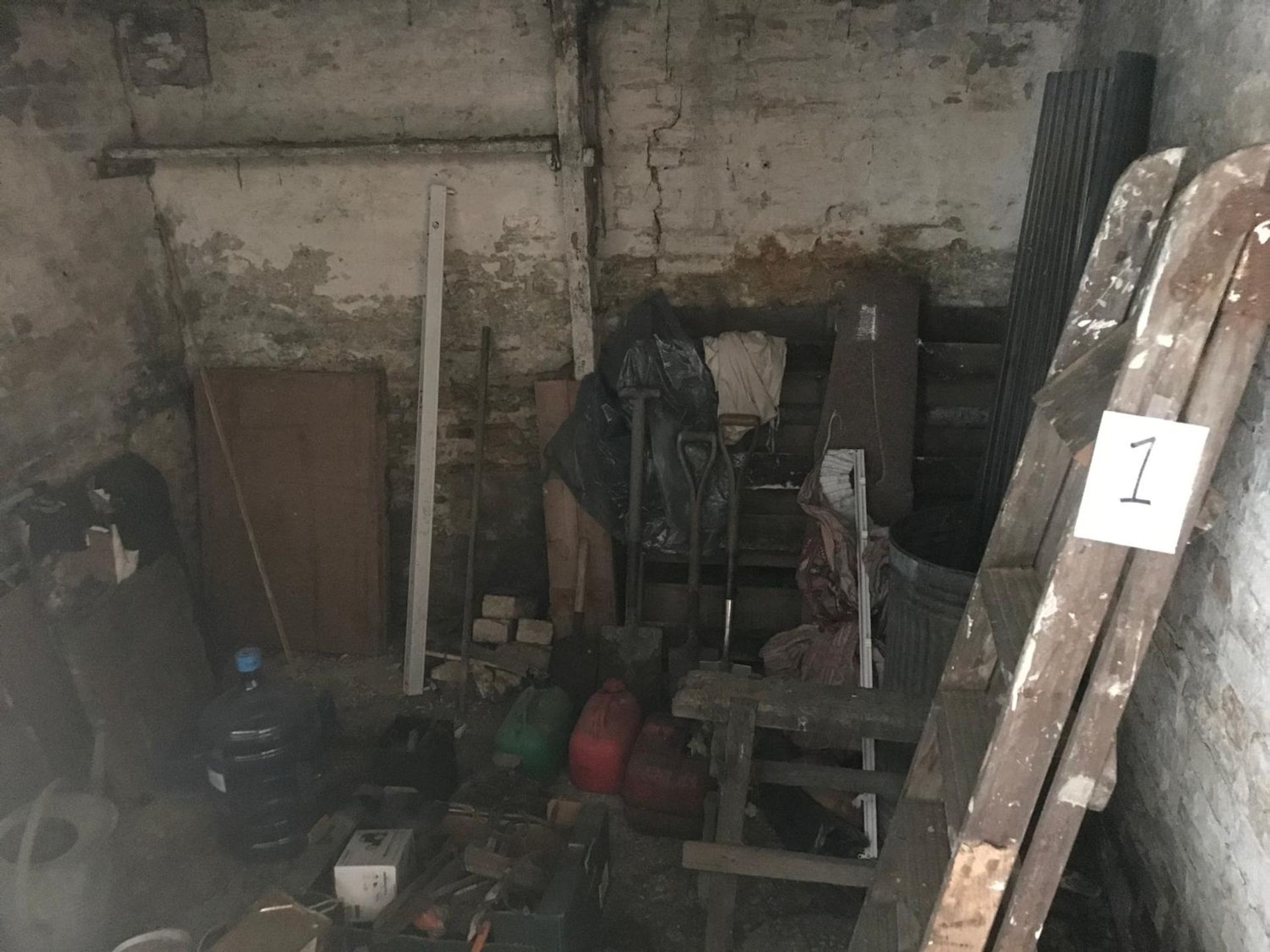 Entire contents of Room One, including spades, saw horse, buckets etc.