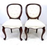 A pair of Victorian mahogany bedroom chairs, with moulded frames, cabriole front legs, modern