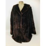 A vintage half length mink coat, labelled 'Serviced by Victor Segall, London', 85cm back length.