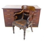 A 1940s oak pedestal desk with a central drawer flanked by two banks of three drawers, 143 by 73