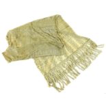 A vintage Egyptian Assuit shawl, circa 1930, the cream net ground decorated with stylised figures