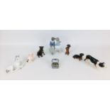 A group of eight Beswick, Limoges and other porcelain items, comprising a four Beswick animal