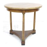 A Continental late 19th century mahogany occasional table, the circular surface raised on three