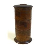 A 19th century treen spice tower, of turned cylindrical stacking box form, with three sections