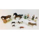 A collection of thirteen Beswick figurines, including a fox, 10 cm by 3.3 by 5.5cm high, two hounds,