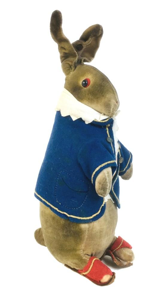 An early 20th century Steiff soft toy of Beatrix Potter's Peter Rabbit, with a white shirt