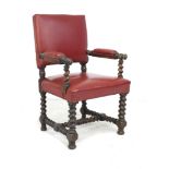 A Victorian mahogany open armchair, in Jacobean style, later upholstered in red leather with