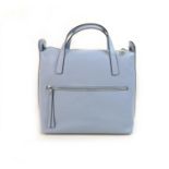 A Nicoli Italian leather handbag, in pale blue leather with metal stud work to the sides, small