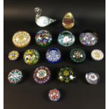 A large collection of Scottish glass paperweights, mostly millefiore, including Strathern,