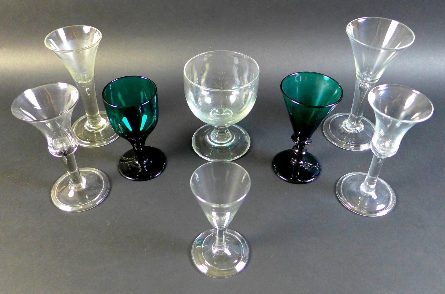 A collection of 18th and 19th century drinking glasses, comprising four Georgian glasses, each