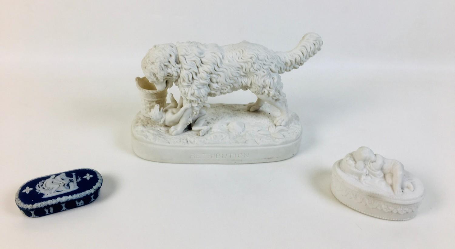 A Victorian Parian ware animal figure group entitled 'Retribution', depicting a large dog standing