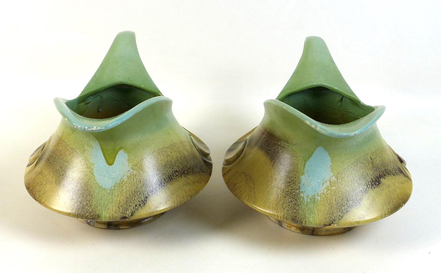 A pair of Dutch Art Deco jugs of squat curvilinear design with slip glaze in pale green, buff and - Image 3 of 7