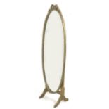 A vintage French style cheval mirror, circa 1960, with oval plate, ribbon crest and gilt style