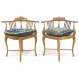 A pair of Edwardian inlaid mahogany corner chairs, 66 by 59.5 by 74.5cm high.