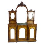 A late Victorian walnut veneered and marquetry sideboard, or narrow form, with arched mirror back