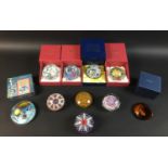 A group of ten paperweights, comprising a Millefiore limited edition Pheonix Paperweights Ltd