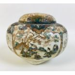 A Japanese early 20th century Satsuma pottery potpourri, vase and pierced cover, decorated with