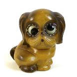 An Oswald rotating eyes clock, in the form of a Pekingese dog, stamped Germany to the back and