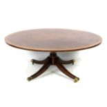 A modern reproduction coffee table, in Regency style with fan veneered and burr walnut crossbanded