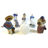 A group of five figurines and a moon flask, comprising Lladro figurine 'Pedro with jug' matte,