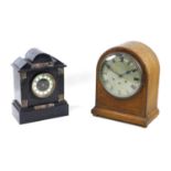Two mantel clocks, comprising a Gustav Becker musical chiming oak veneered domed case mantel
