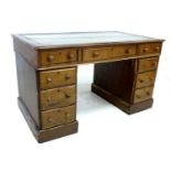 An Edwardian oak pedestal desk, with inset leather top, nine drawers, a/f poor condition, 118 by