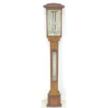 A Victorian oak cased stick barometer, by West of London, with engraved ivory dial, 17.5 by 9 by