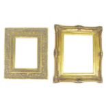 Two modern gilt composition wall mirrors, each with bevelled plates, 65.5 by 5.5 by 75cm high and