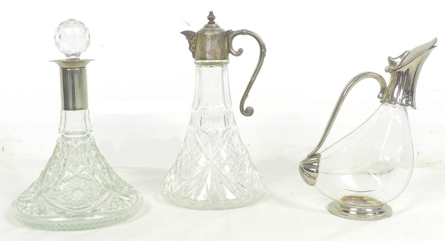 A group of three glass decanters, comprising a ship's decanter with silver plated 'Green Man' mask - Image 2 of 2