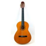 A Spanish made classical guitar by Almeria, label to interior.