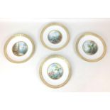 A set of four late Victorian Mintons plates, decorated with hand painted scenes from nature,