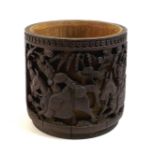A Chinese bamboo brush pot, bitong, Qing Dynasty, late 19th century, carved in relief with four