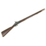 An early 19th century single barrelled percussion cap rifle, walnut stock, stamped 1810, barrel