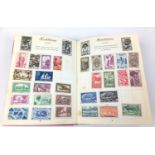 Three albums of early 20th century and later international stamps, including China, Europe,