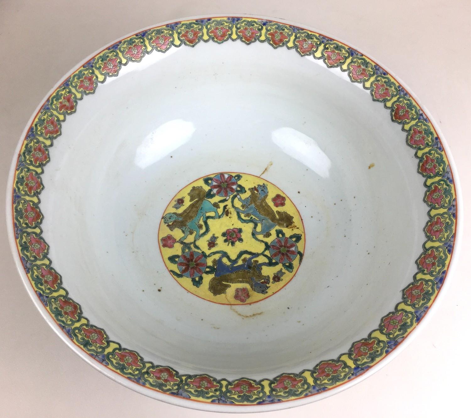A large Chinese 20th century bowl, decorated with a floral rim to its interior and a phoenix and - Image 2 of 3