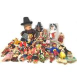 A group of various toys including thirty three 20th century dolls of various sizes and Meccano,