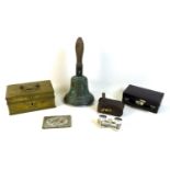 A group of collectables, comprising a 19th century bronze hand bell with iron clapper, 15.5 by