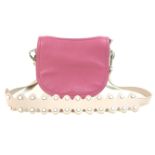 A small Nicoli Italian leather handbag, in two-toned mushroom and pink colour, with detachable strap