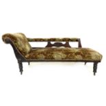 A late Victorian mahogany chaise longue, with carved frame, turned legs and castors, upholstered