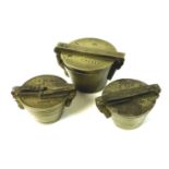 A group of three Continental brass nested cup weights, made in Nuremberg comprising seven weight