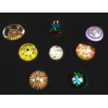 Eight paperweights, comprising of millefiori paperweights with three by Perthshire Paperweights,