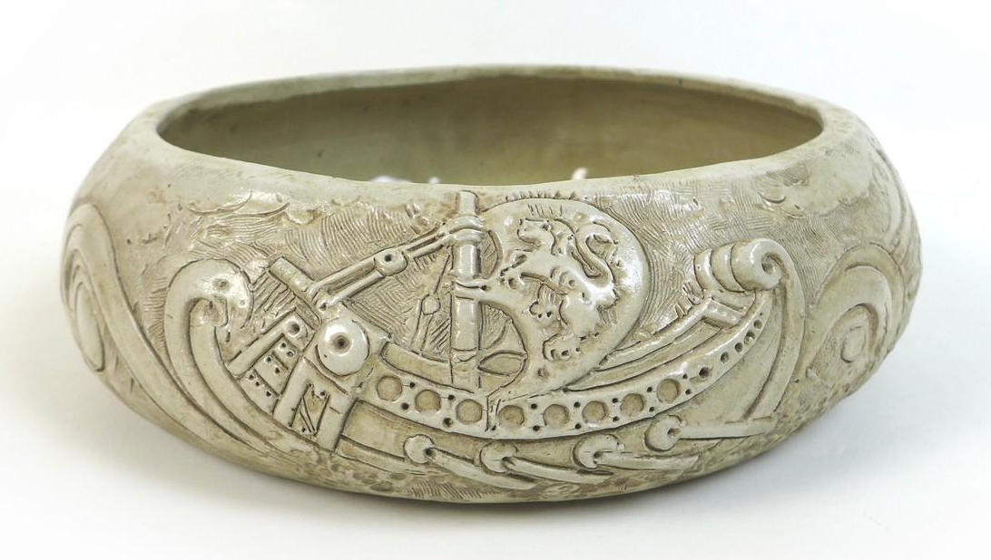 William Oram Trivett (British, 1872-1955), ceramic bowl, signed 'W.O. Trivett', with relief