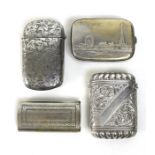 A group of four metal Victorian and later vesta cases. (4)