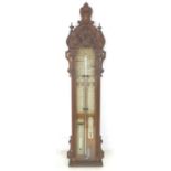 A Victorian Admiral Fitzroy stick barometer, in Gothic carved oak case, 30 by 9 by 125.5cm high