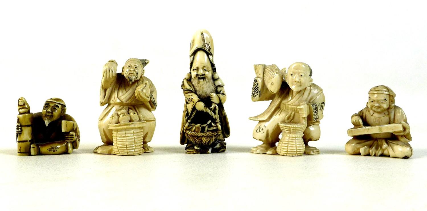 A group of five Japanese ivory katabori netsuke, late 19th and early 20th century, comprising a